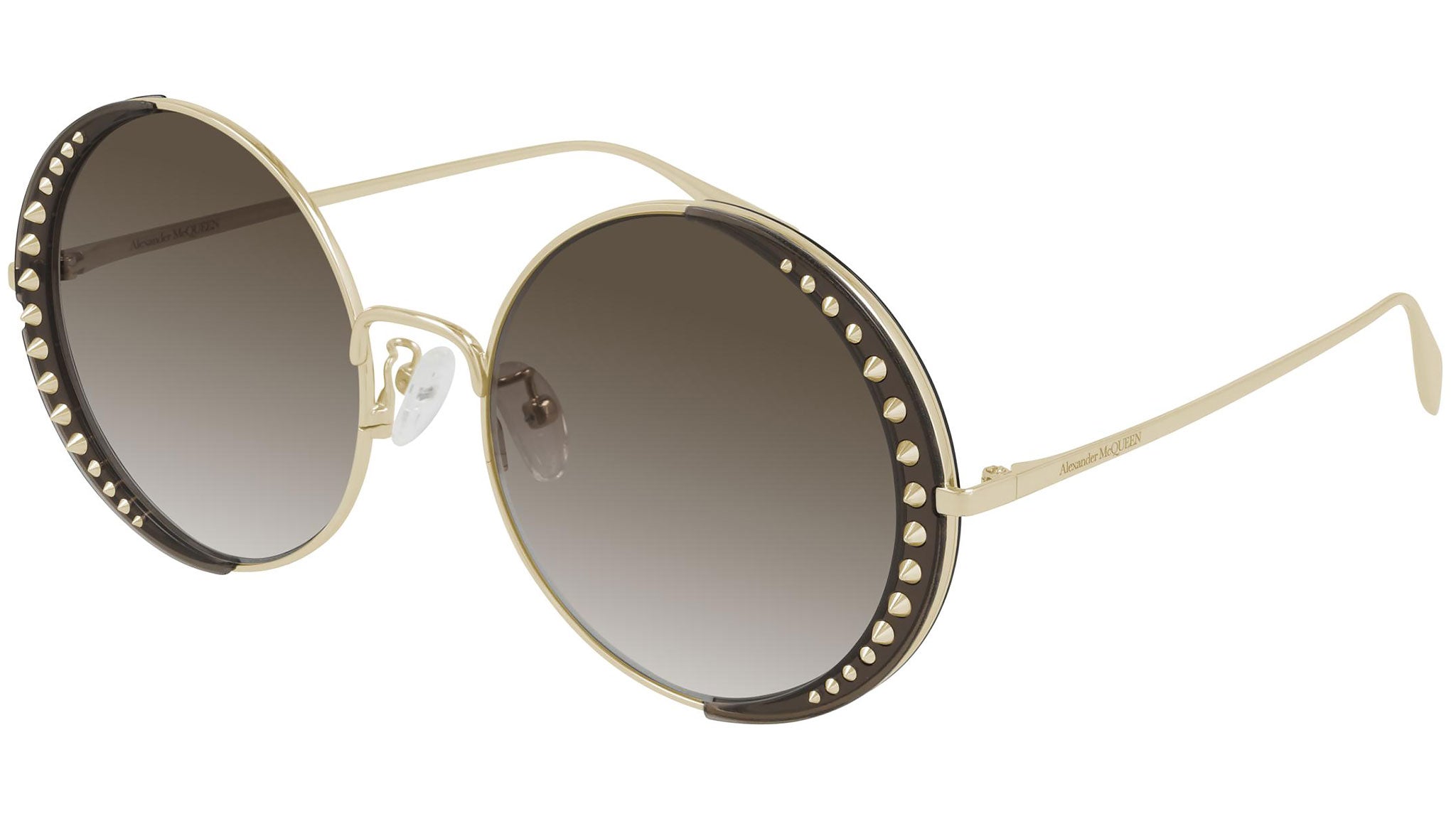 Occhiali da sole ALEXANDER MCQUEEN AM0311S Shiny light gold metal front and shiny transparent brown acetate insert